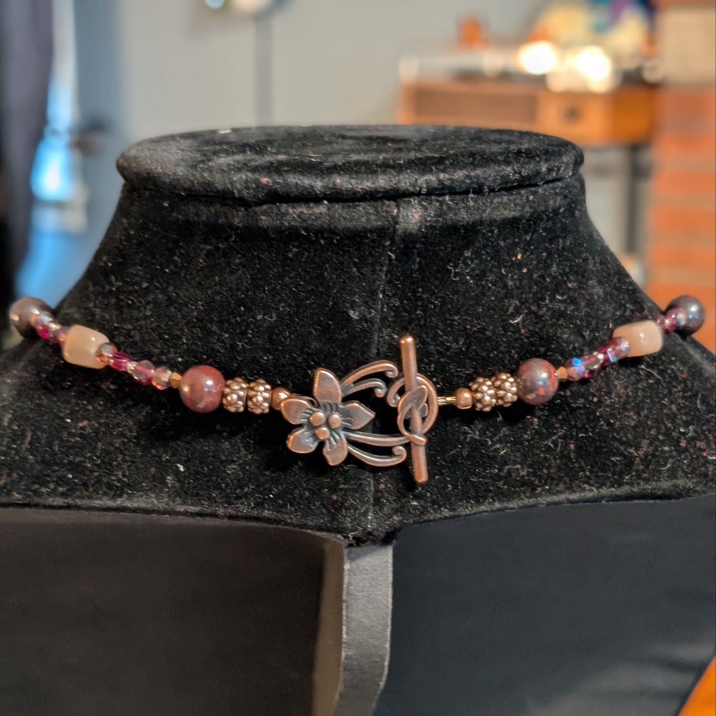 ✨Mauvelight Intrigue✨| Rhodolite Garnet, Sunstone & Tourmaline-in-Jasper Necklace With Skeletal Cameo & Floral Toggle