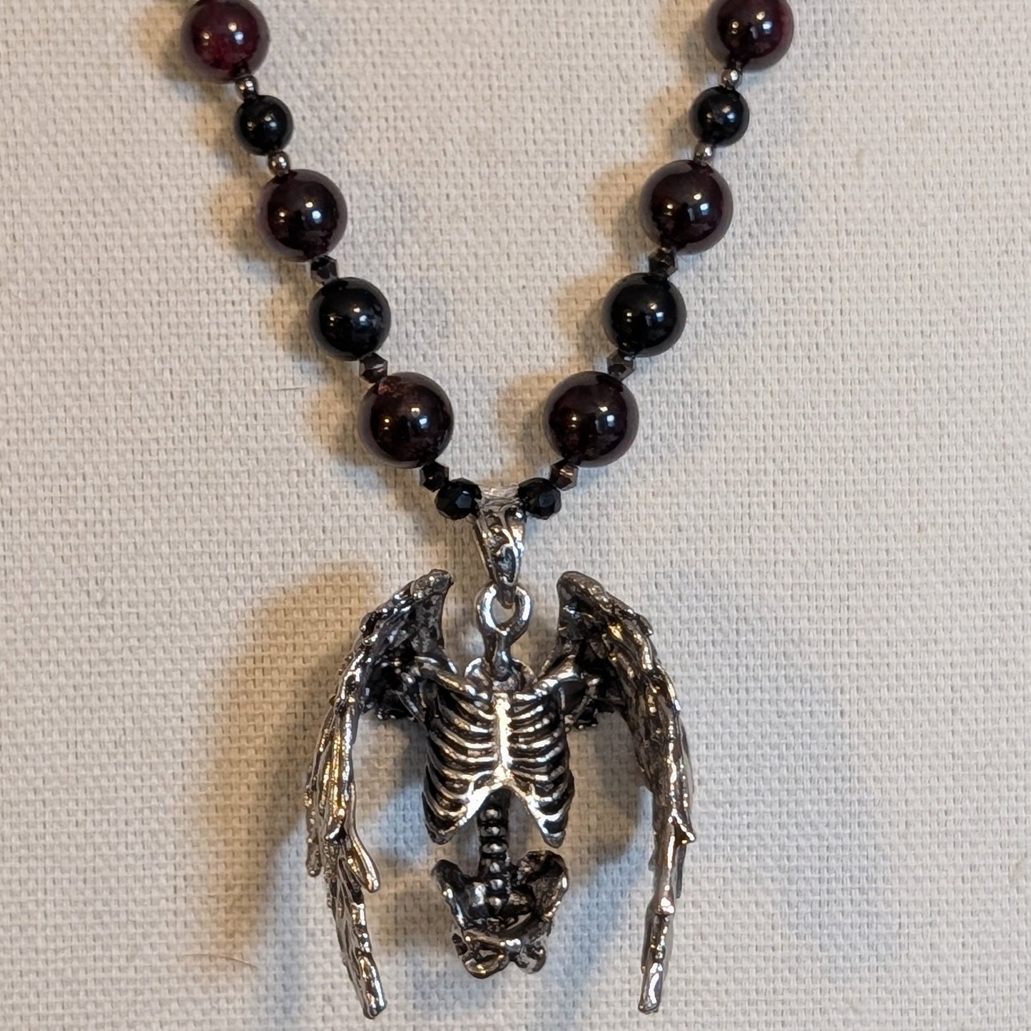 ✨Hollowheart Flight✨| Garnet & Black Tourmaline Necklace with Winged Ribcage Pendant