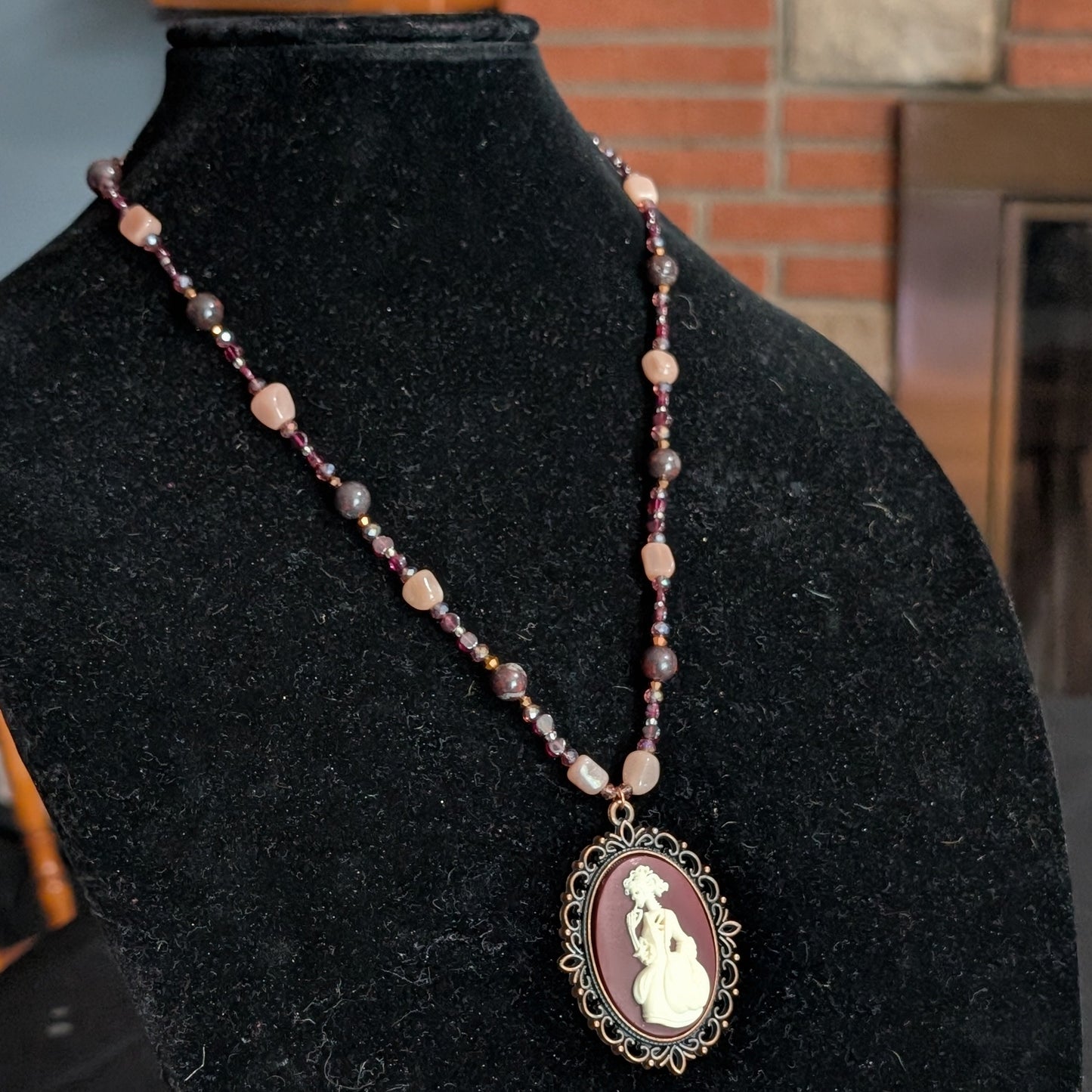 ✨Mauvelight Intrigue✨| Rhodolite Garnet, Sunstone & Tourmaline-in-Jasper Necklace With Skeletal Cameo & Floral Toggle