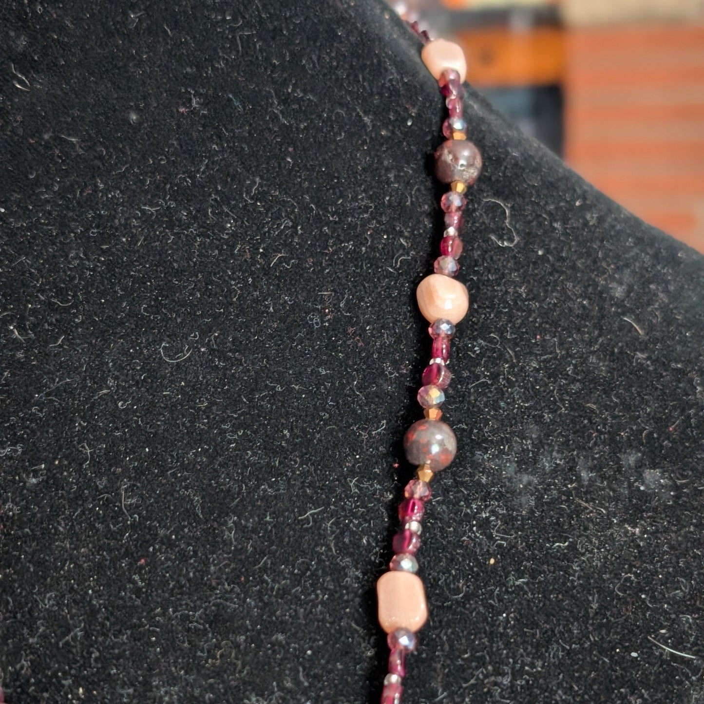 ✨Mauvelight Intrigue✨| Rhodolite Garnet, Sunstone & Tourmaline-in-Jasper Necklace With Skeletal Cameo & Floral Toggle