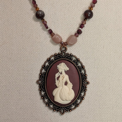 ✨Mauvelight Intrigue✨| Rhodolite Garnet, Sunstone & Tourmaline-in-Jasper Necklace With Skeletal Cameo & Floral Toggle