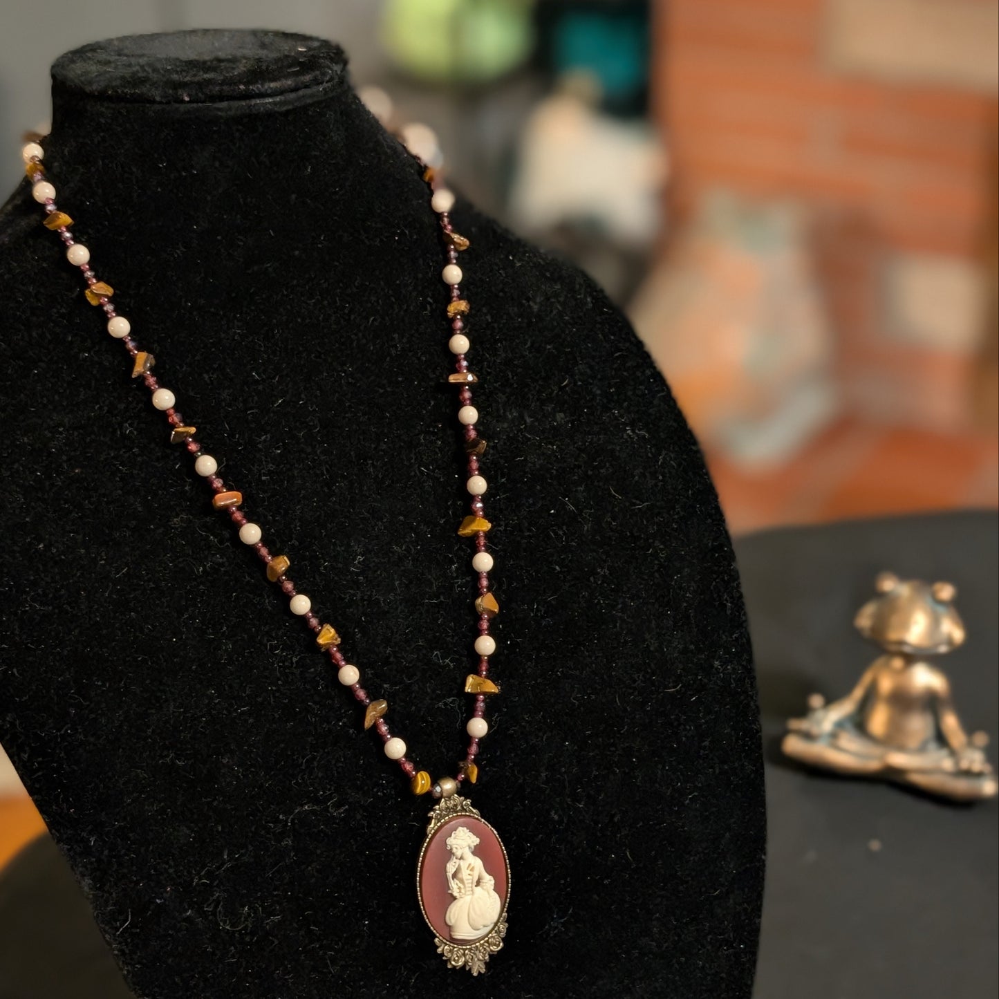 ✨Madame Foladrop✨| Garnet, Riverstone & Tiger’s Eye Skeleton Cameo Necklace
