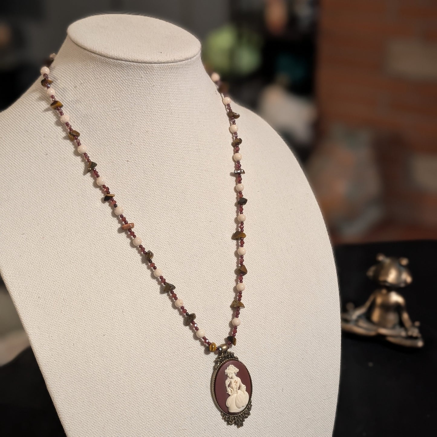 ✨Madame Foladrop✨| Garnet, Riverstone & Tiger’s Eye Skeleton Cameo Necklace