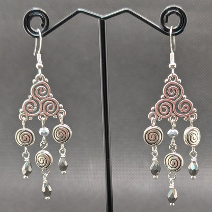 ✨Triskeligo✨ | Silver Triple Spiral Chandelier Earrings with Faceted Black Drops